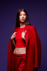 Fashion asian female model in red coat. - 651440657