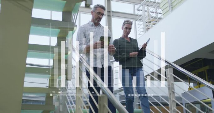 Animation of graph, caucasian coworkers discussing while walking down stairs in office