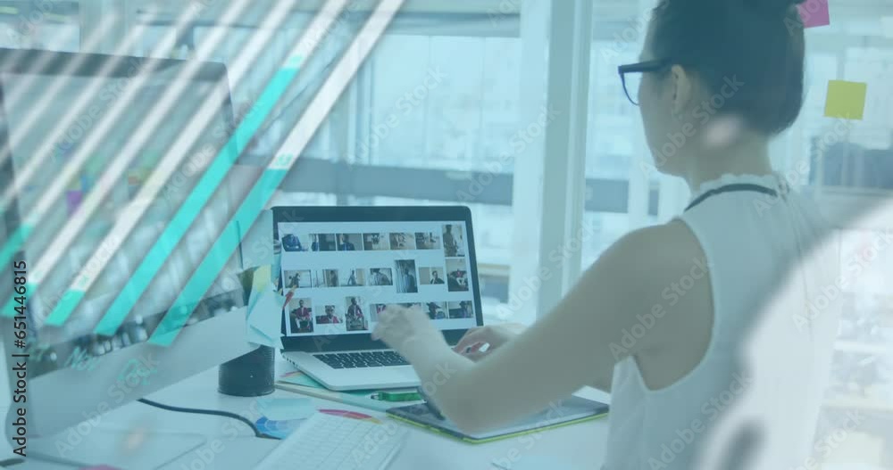 Poster Animation of graph, globe and computer language over asian woman working on laptop in office