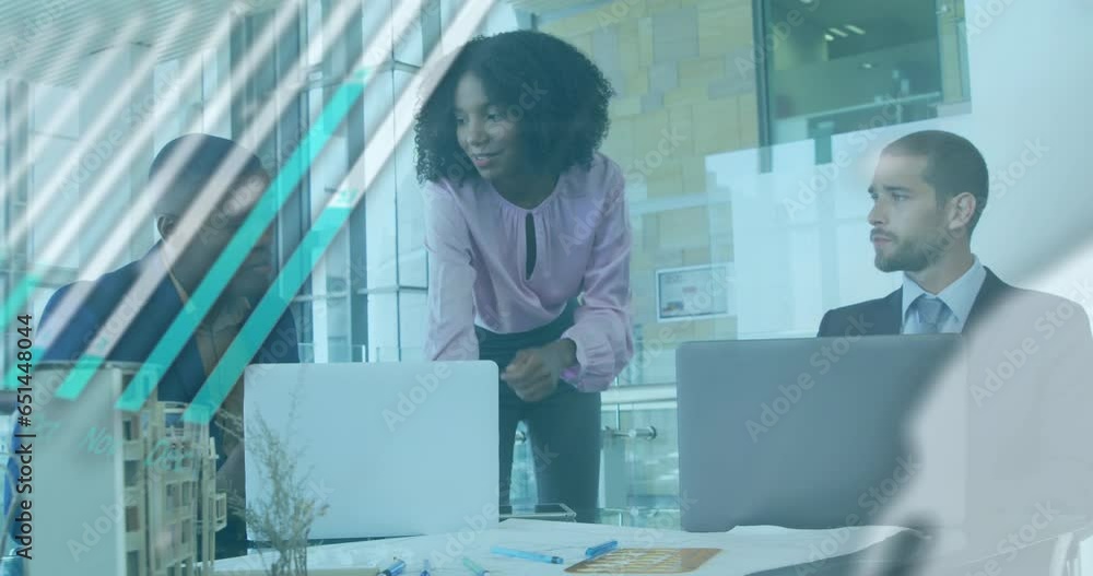 Poster animation of graph, globe and computer language over diverse coworkers discussing reports in office