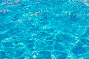 Fototapeta na wymiar clear blue water swimming pool background