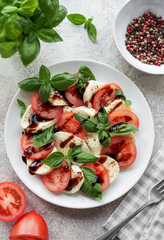 Caprese salad with tomatoes, mozzarella and basil.