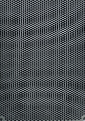 Background, texture of a musical speaker made of metal lattice.