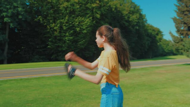 Upset charming teenage girl baseball player with glove failed to catch ball after batting , expressing expressing disappointment and negative emotion while playing game on field.