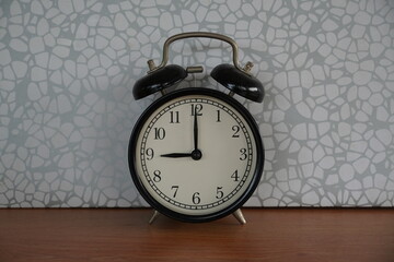 alarm clock against grey background - 651463226