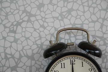 alarm clock against grey background - 651463230