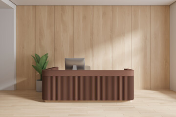 Elegant reception interior brown desk with pc computer and decoration