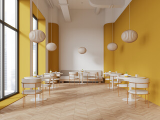 White and yellow restaurant interior with sofa