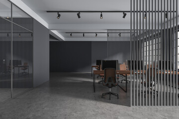 Grey office interior with pc computers and furniture, panoramic window