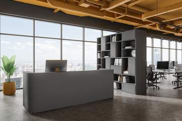 Grey office interior with reception desk and coworking zone, panoramic window