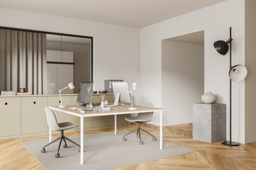 White workspace interior with pc monitors and drawer with folders and decor