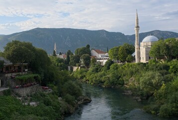 Mostar, Bosnia and Herzegovina - Sep 15, 2023: Neretva river. A walking in the center of Mostar...