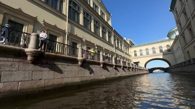 Overview of the sights of St. Petersburg, view from the Neva River. Shot on iPhone 14 pro max . Walking along the Neva River in St. Petersburg by boat POV view