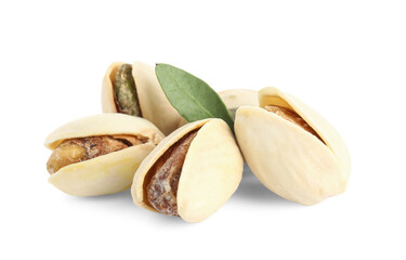 Tasty pistachio nuts on white background