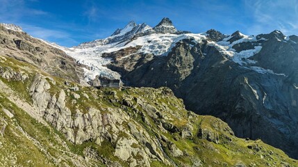 View of the SAC Glecksteinhütte and the Oberer Grindelwald Glacier and Pak Schreckhorn. Beautiful...