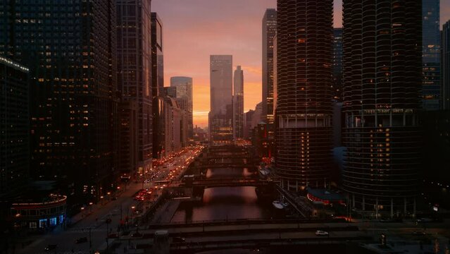 Aerial wide footage. Downtown Chicago street in the amazing sunset time. 