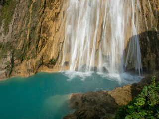 Waterfall with crystal clear blue water in the jungle, El-Chiflon, Mexico