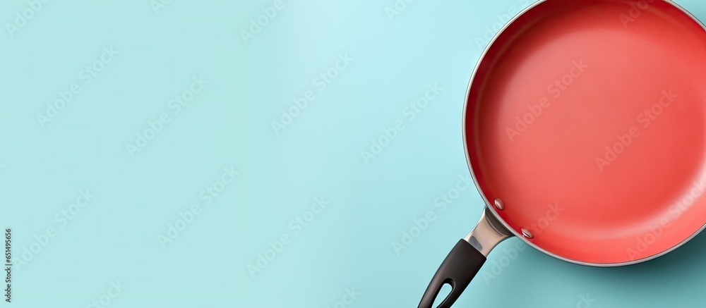 Poster copy space image of top view of a new empty frying pan