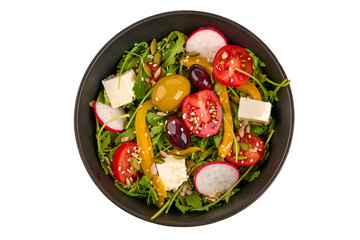 Vegetable salad with feta cheese, tomatoes, isolated on white background. High resolution image.