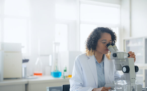 Black female scientist doing research in the laboratory.