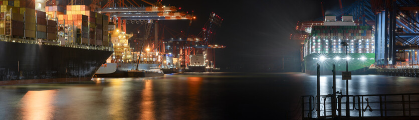 Container terminal in the port of hamburg at night 