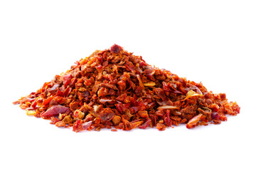 Paprika red pepper isolated on white background. Heap of crushed red pepper isolated on white background. Pieces of red pepper isolated on white background. Paprika isolated on white background.