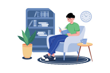 Man reading a book while sitting at home comfortably