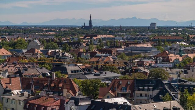 Munich panoramic view city centre downtown munich skyline aerial view time lapse in background pre alps montains.