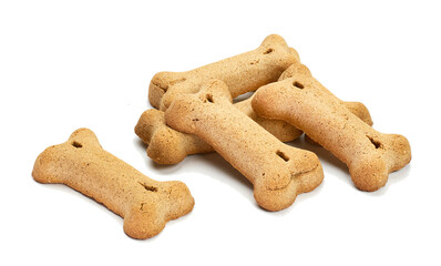 Dry dog food in the form of bones on a white background. Top view.