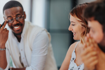 Successful Marketing Team Discussing Creative Campaign Management Strategy in Modern Office