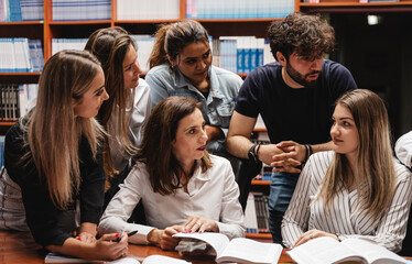 Professor explaining to a group of students