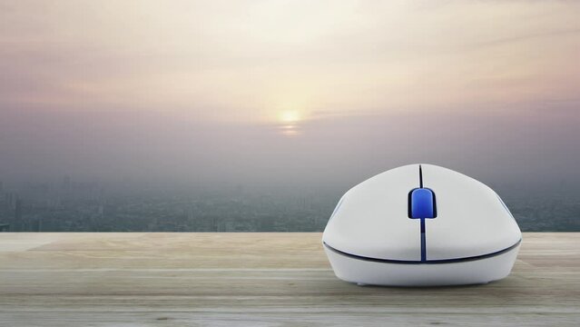 Car with shield flat icon on wireless computer mouse on wooden table over modern city tower and skyscraper at sunset sky, vintage style, Business automobile insurance online concept