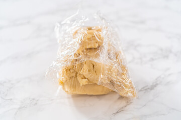 Panda shaped shortbread cookies with chocolate icing