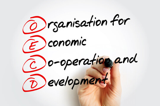 OECD Organisation for Economic Co-operation and Development - global policy forum that promotes policies to improve the economic and social well-being of people, acronym text with marker
