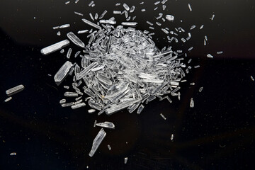 Close up of menthol crystals on black background.  - obrazy, fototapety, plakaty