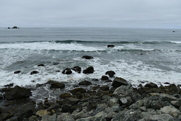waves crashing on rocks
