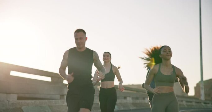 People, fitness and running in city for workout, outdoor exercise or training together in urban town. Group of active runners or athlete in sprint, cardio or sports for marathon, race or practice