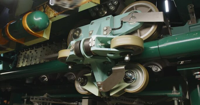 Close-up of the mechanism roller coaster along the rails.
