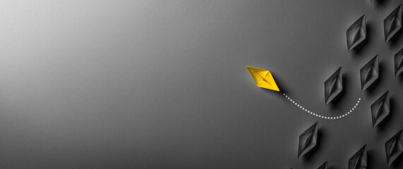 Yellow Paper Boat Leaving Mainstream And Changing Direction On Modern Grey Background - Entrepreneur Concept - obrazy, fototapety, plakaty