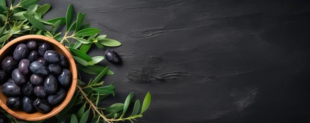 Fotobehang Many fresh and ripe black olives in wooden bowl, healthy food panorama banner. Generative Ai. © annamaria