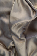 part of the fabric from beige-colored clothing