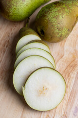 Ripe pear cut into different pieces