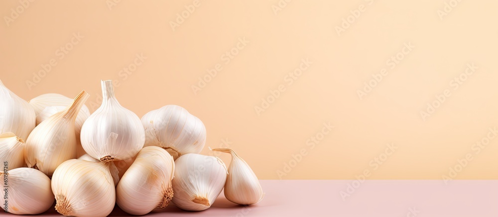 Poster Garlic cloves isolated on a isolated pastel background Copy space with clipping path