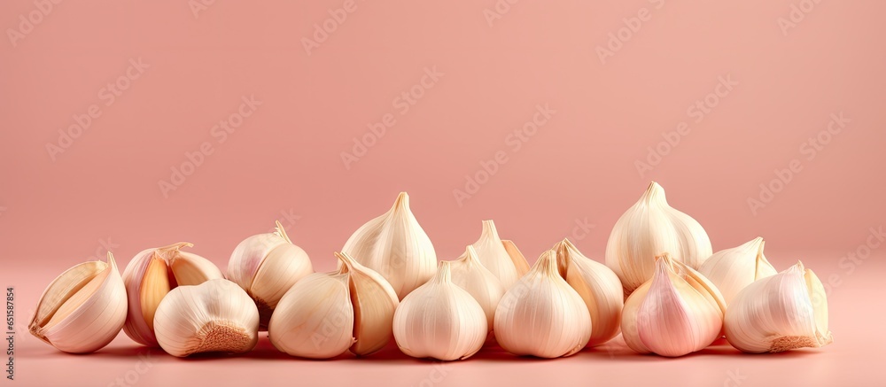 Poster Garlic cloves isolated on a isolated pastel background Copy space with clipping path