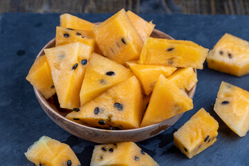 ripe orange watermelon with black pits watermelon close-up