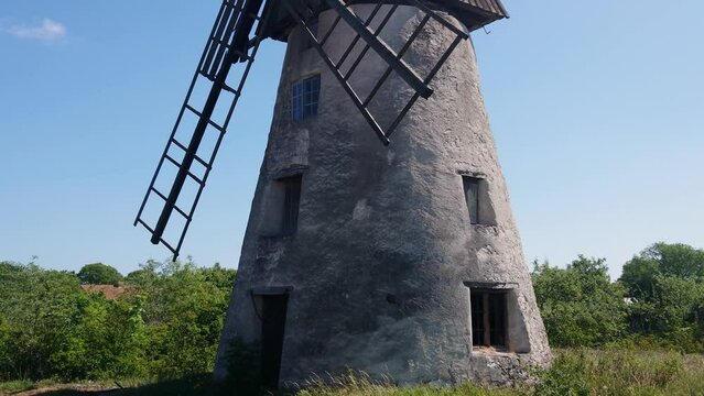 Abandoned old windmill of the bay Farosund Gotland island