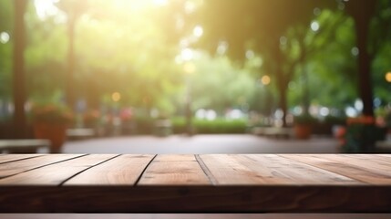 empty wooden table for display with green park background - obrazy, fototapety, plakaty