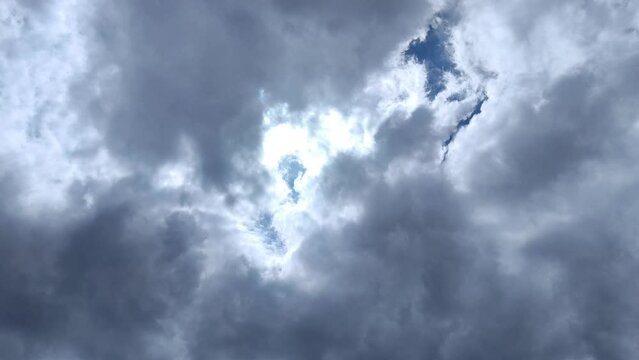 The dark cloudy sky finally clears and the light arrives