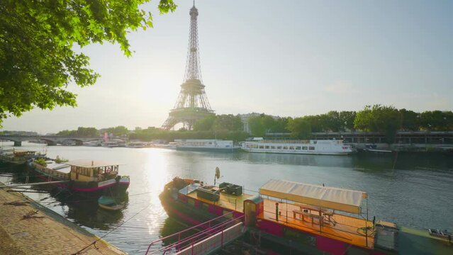 Residential barges on the River Seine and Eiffel tower, Paris, France