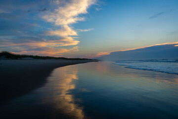 Fototapeta na wymiar Sunrise over the lifeguarded beach on Ocracoke Island.